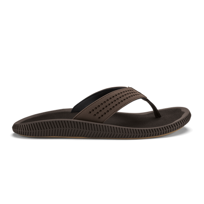 Dark brown thong sandal with studded upper strap and textured sole.