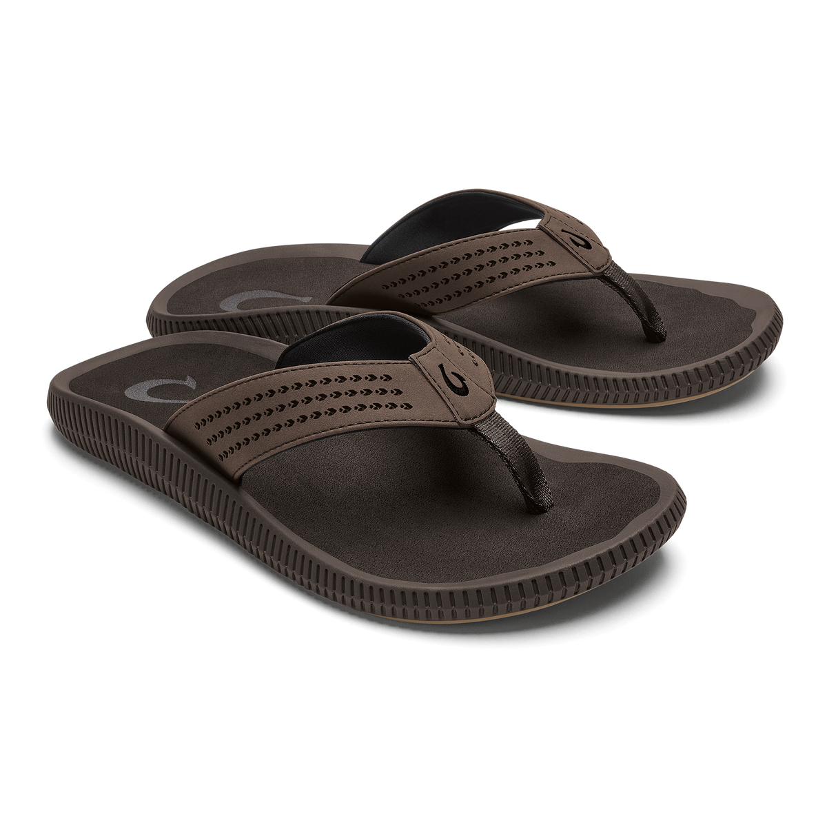 Pair of dark brown flip-flops with perforated straps and textured soles.