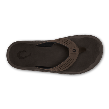 Dark brown flip-flop with textured thong strap and perforated detailing, shown from above.