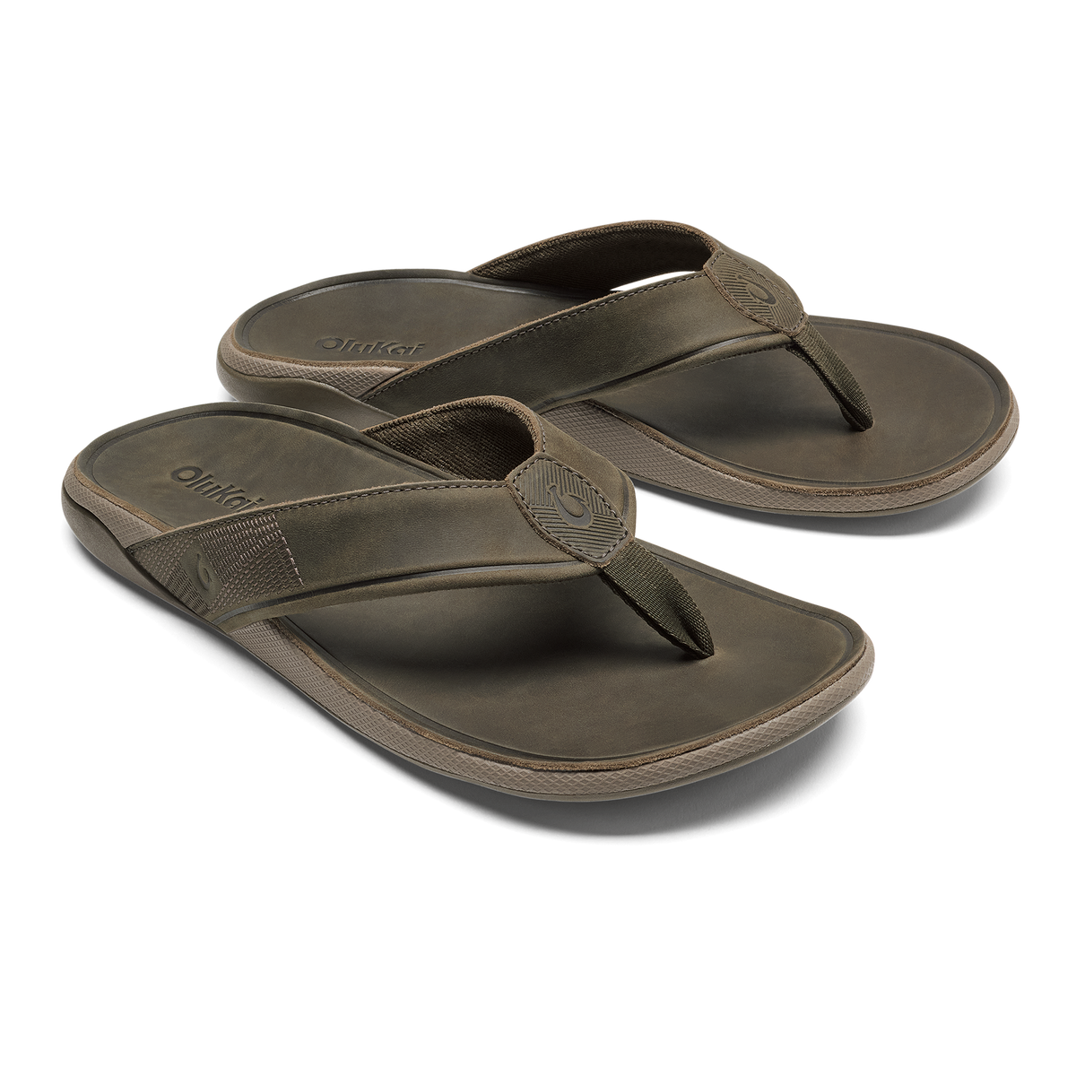 Pair of olive-gray flip-flop sandals with textured fabric straps and molded footbeds.