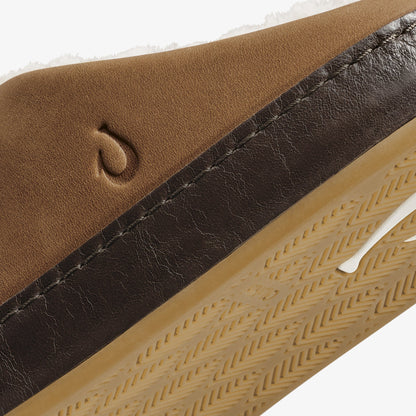 Toffee suede and dark java leather shoe with textured sole and brand logo detail.