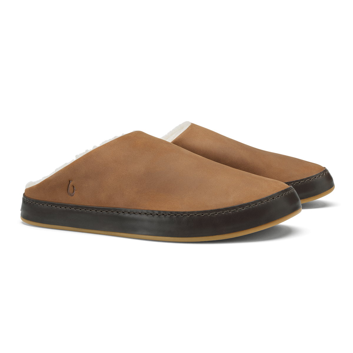 Pair of toffee-colored suede slippers with dark java leather trim and tan rubber soles.