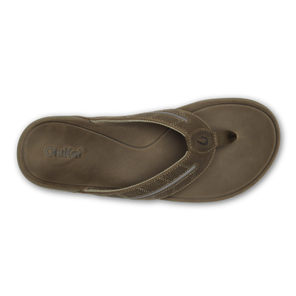 Tan thong sandal with textured straps and cushioned footbed, shown from above.