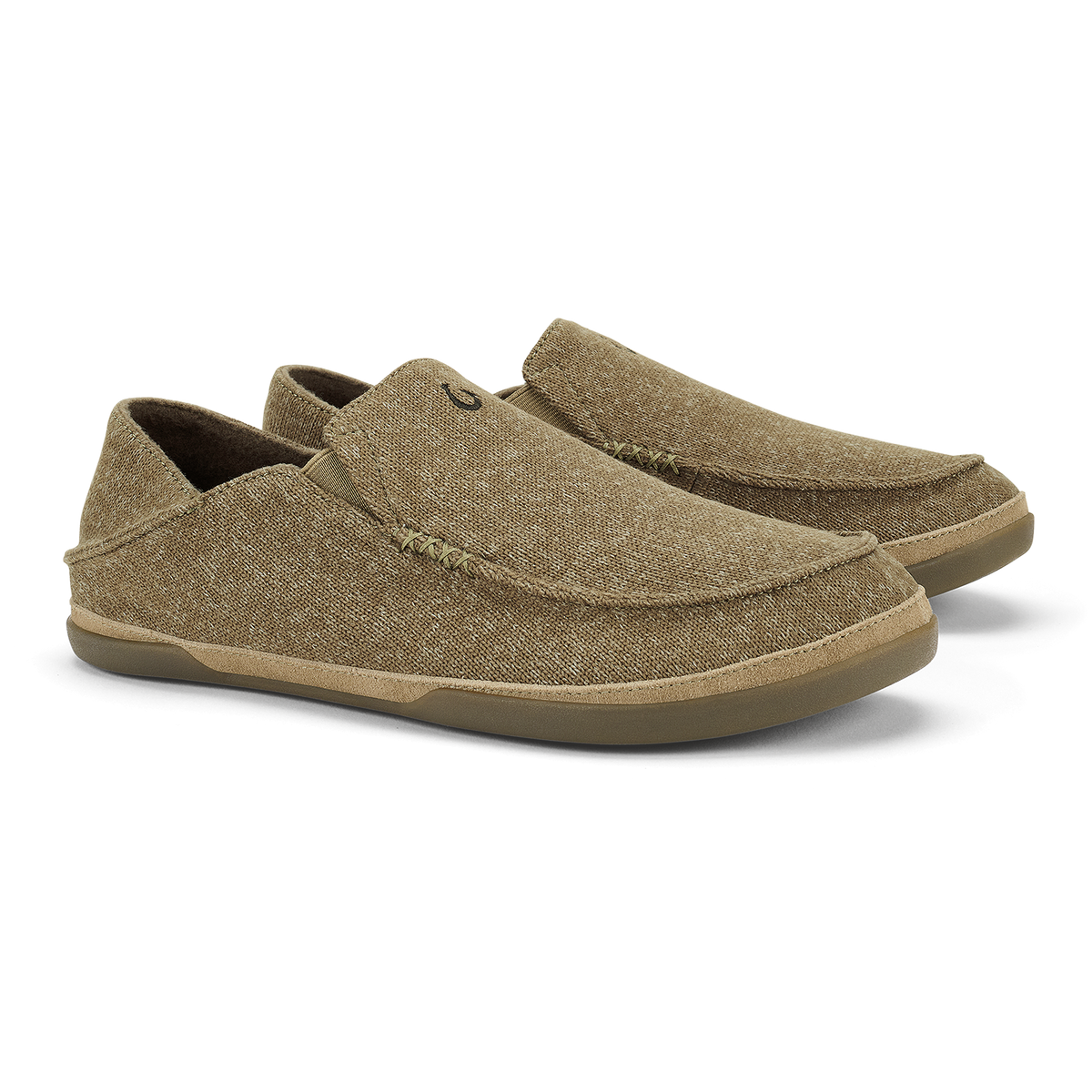 Pair of tan woven slip-on loafers with tan rubber soles and stitched seams.
