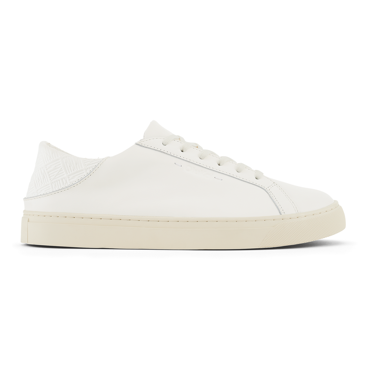 White leather lace-up sneaker with cream rubber sole and textured heel panel.
