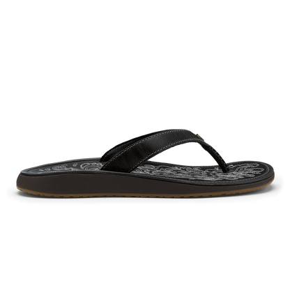 Black flip-flop sandal with woven textured footbed and contrasting stitched thong strap.