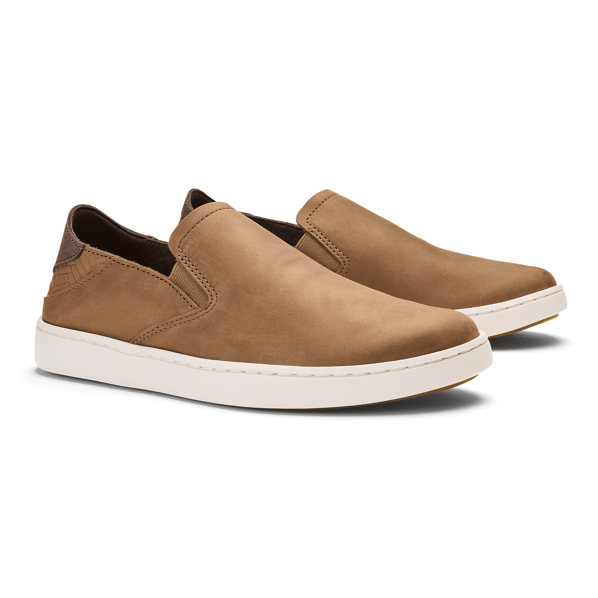 Tan leather slip-on sneakers with dark brown heel tab and white rubber sole.