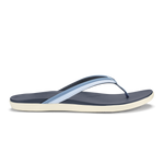 Navy flip-flop with light blue toe strap and cream-colored sole, shown in profile against white background.
