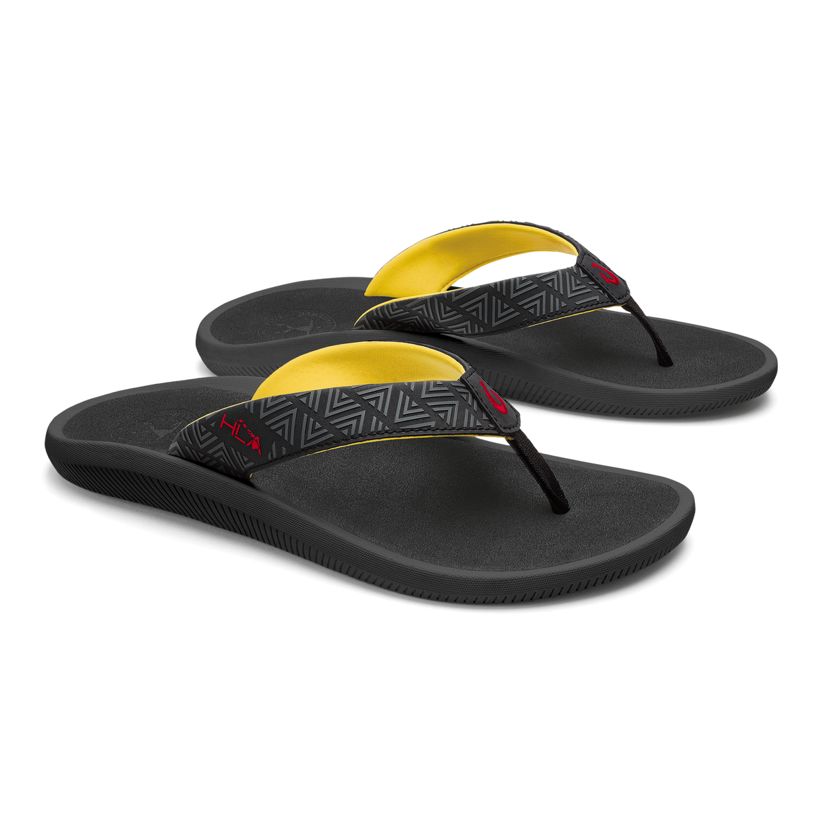 Black flip-flops with yellow arch straps and geometric patterned toe post bands.