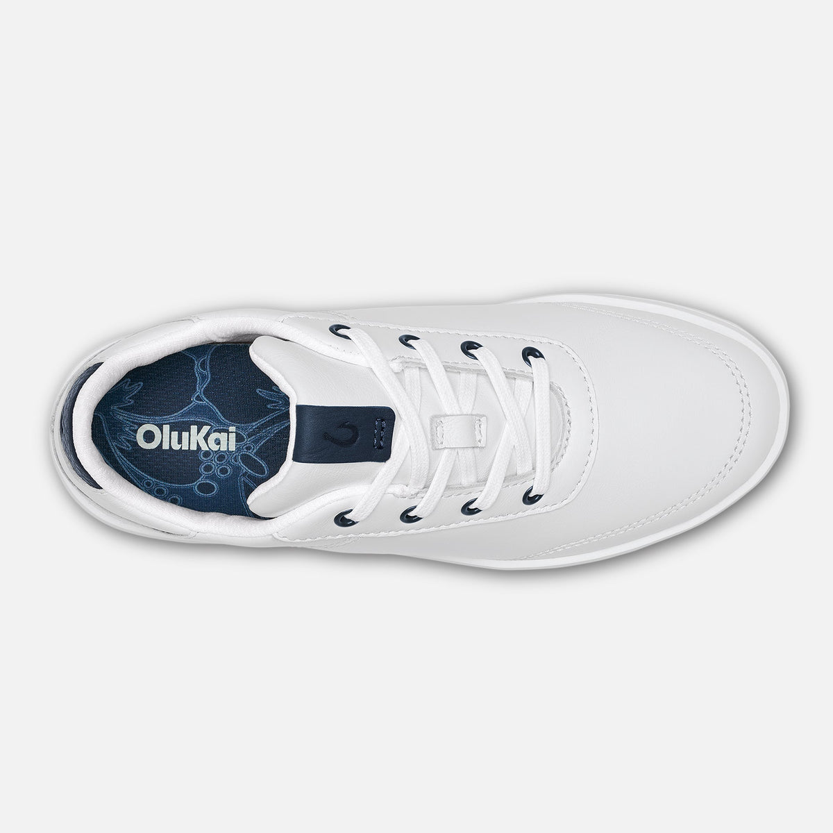 White high-top sneaker with dark blue tongue and lace details, shown from above.
