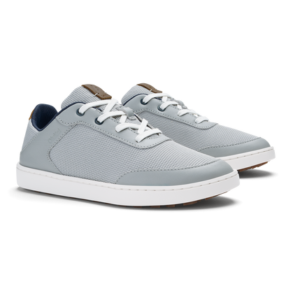 Grey and tan lace-up sneaker with white sole and navy heel tab.